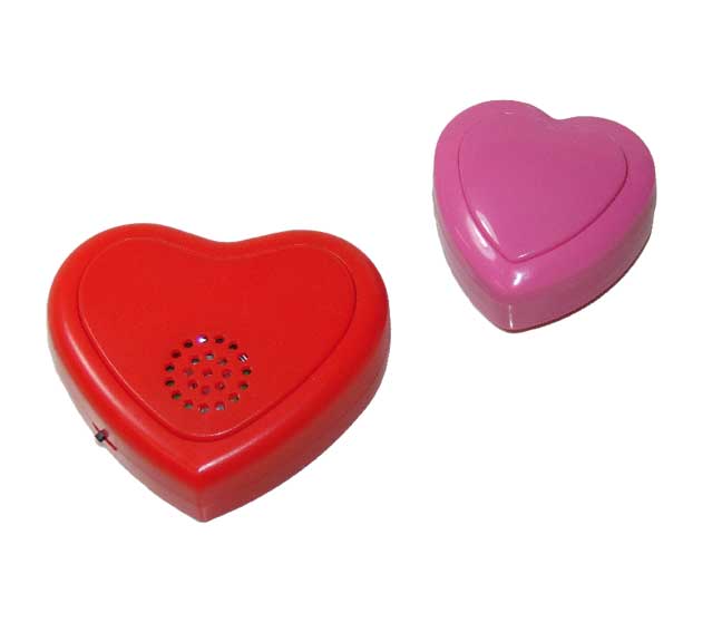 Image of red heart-shaped 30-second recordable sound button and a pink beating and pulsing heart box.